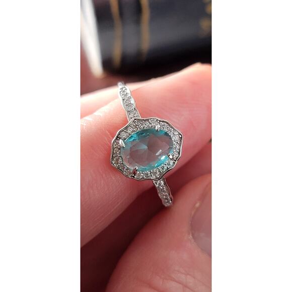Stunning Rhodium-Plated Size 9 Ring with Aqua Blue Gemstone and Halo Accents - Picture 8 of 11